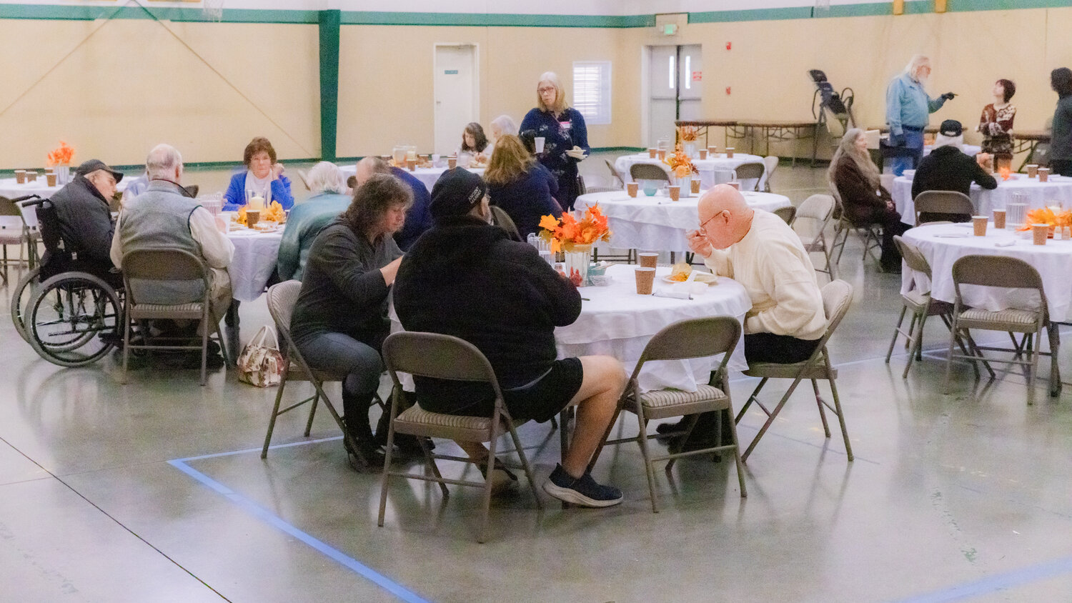 Visitors mingle and eat together on Thanksgiving at Immanuel Lutheran Church in Centralia Thursday, Nov. 23.