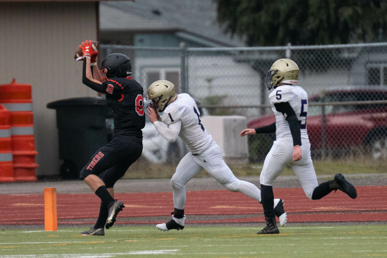 James Grose gets a foot down to convert a two-point conversion in the first half of Napavine's 36-26 win over Onalaska in the 2B semifinals at Tumwater District Stadium on Nov. 25.