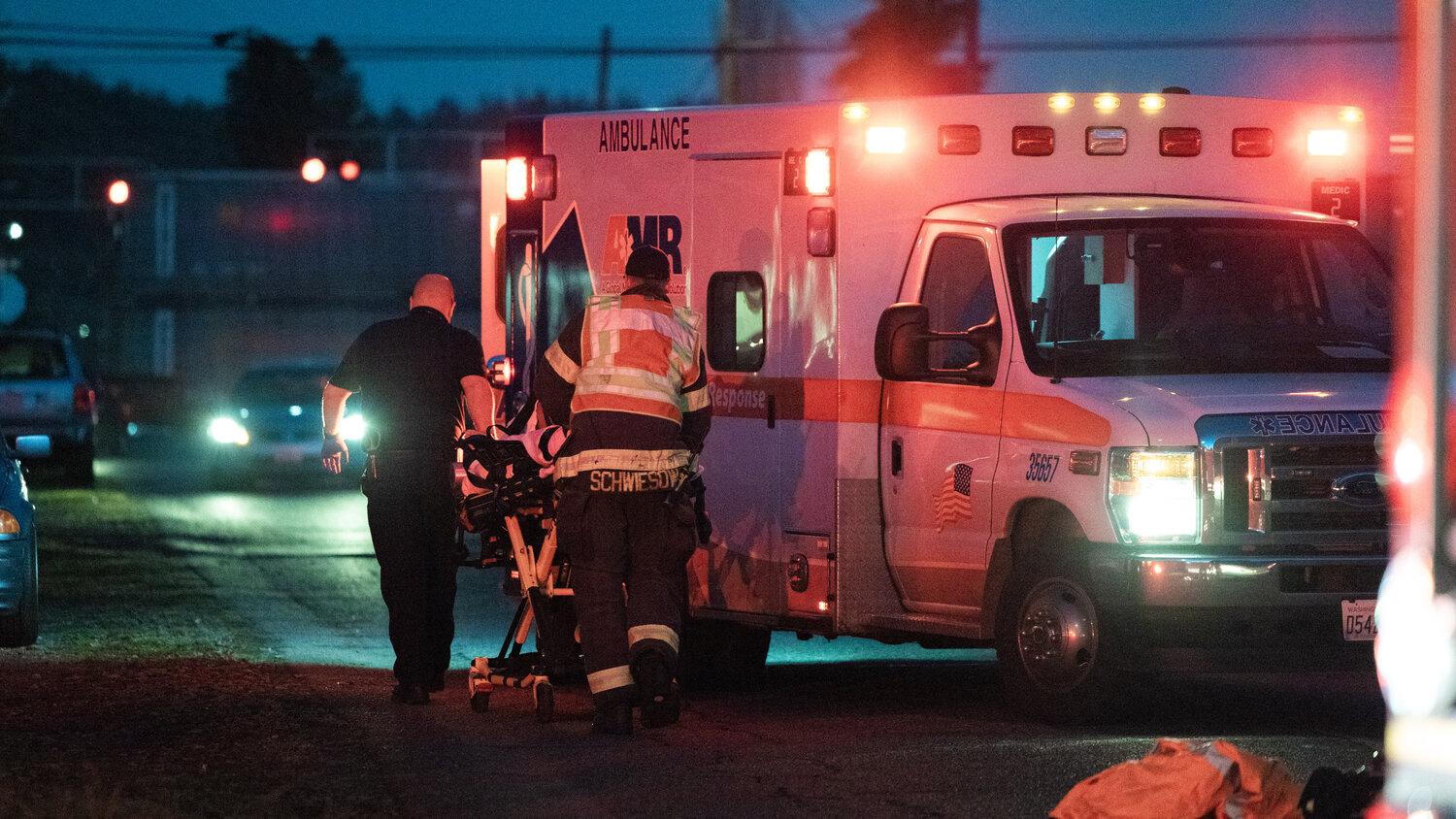 A paramedic and firefighter transport a man on a gurney following a hit-and-run in Centralia on Friday, Nov. 24, at the intersection of South Pearl Street and West Summa Street. It occurred just after 4:50 p.m. According to Centralia police call logs, witnesses called 911 after observing a pedestrian get struck by a red vehicle while crossing the street. The driver of the vehicle fled the scene in the car that was later located and seized as evidence by law enforcement. The pedestrian was airlifted to a hospital and is believed to be in critical condition. The case is still under investigation.