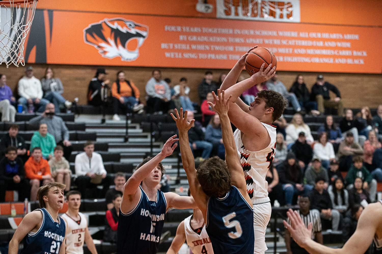 David Daarud shoots over two defenders during Centralia's loss against Hockinson on Nov. 27.