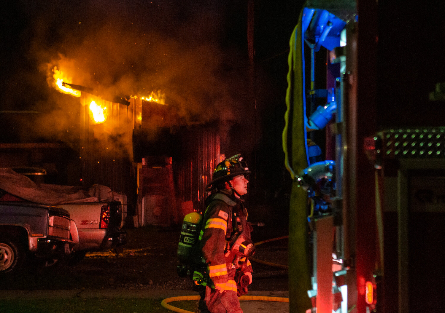Riverside Fire Authority and Centralia Police respond to a burning outbuilding near the corners of North Pearl and Fourth Streets on Tuesday night, Nov. 21, at about 6:30 p.m.