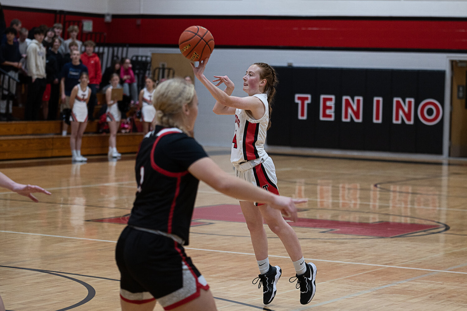 Brynn Williams fires an open three during Tenino's loss to Toledo on Nov. 29.