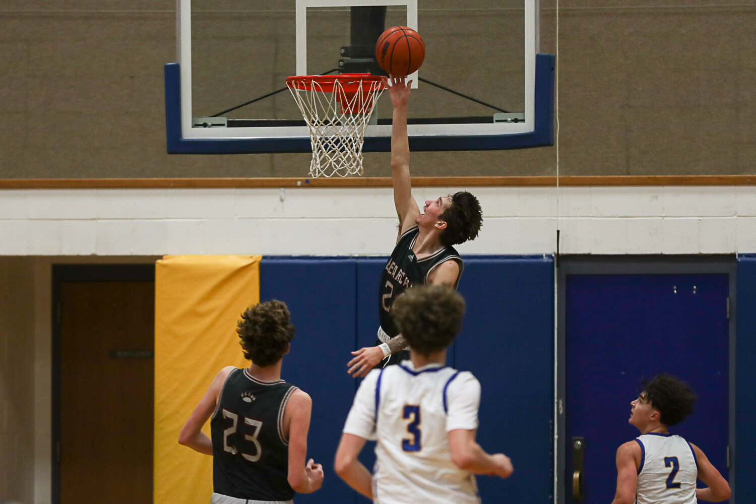 Tyler Klatush lays one in during a fastbreak during W.F. West's win at Rochester on Dec. 5.
