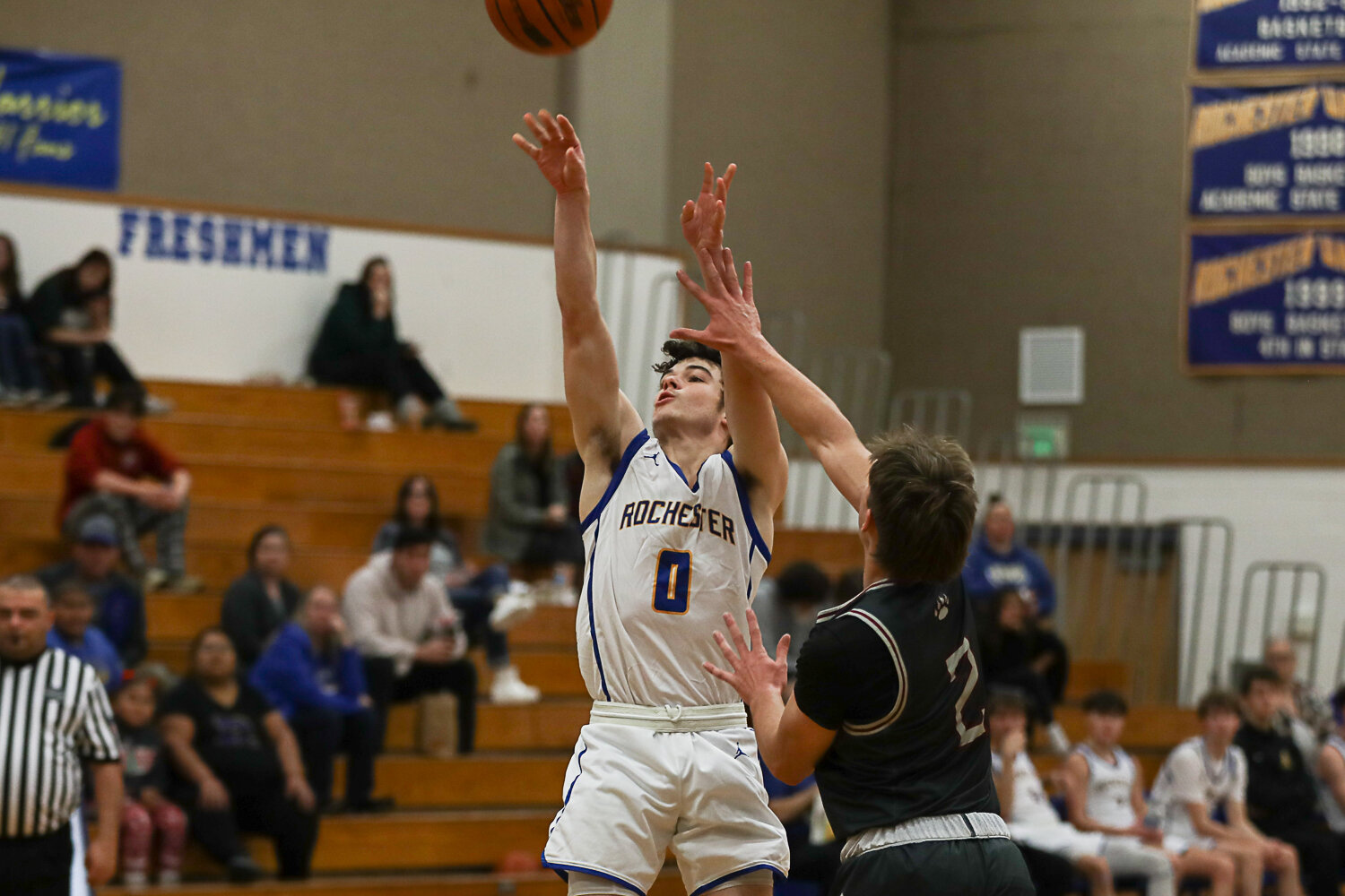 Carson Rotter fires a step-back jumper during Rochester's loss to W.F. West on Dec. 5.
