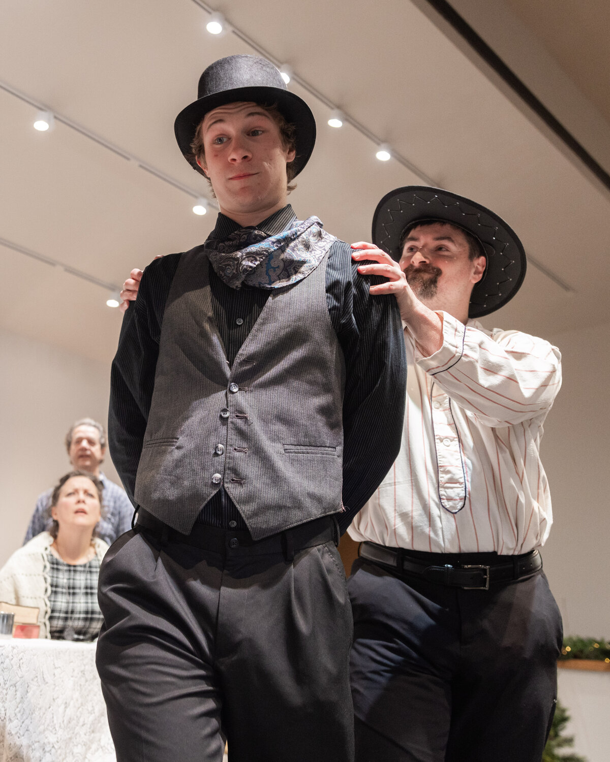 Sam Mittge as Mayor Thomas Percifield, left, and Alex Johnson as Jake Headley, right, perform on stage during dress rehearsals for the Christmas at Rattlesnake Gulch play at Mountain View Baptist Church in Centralia.