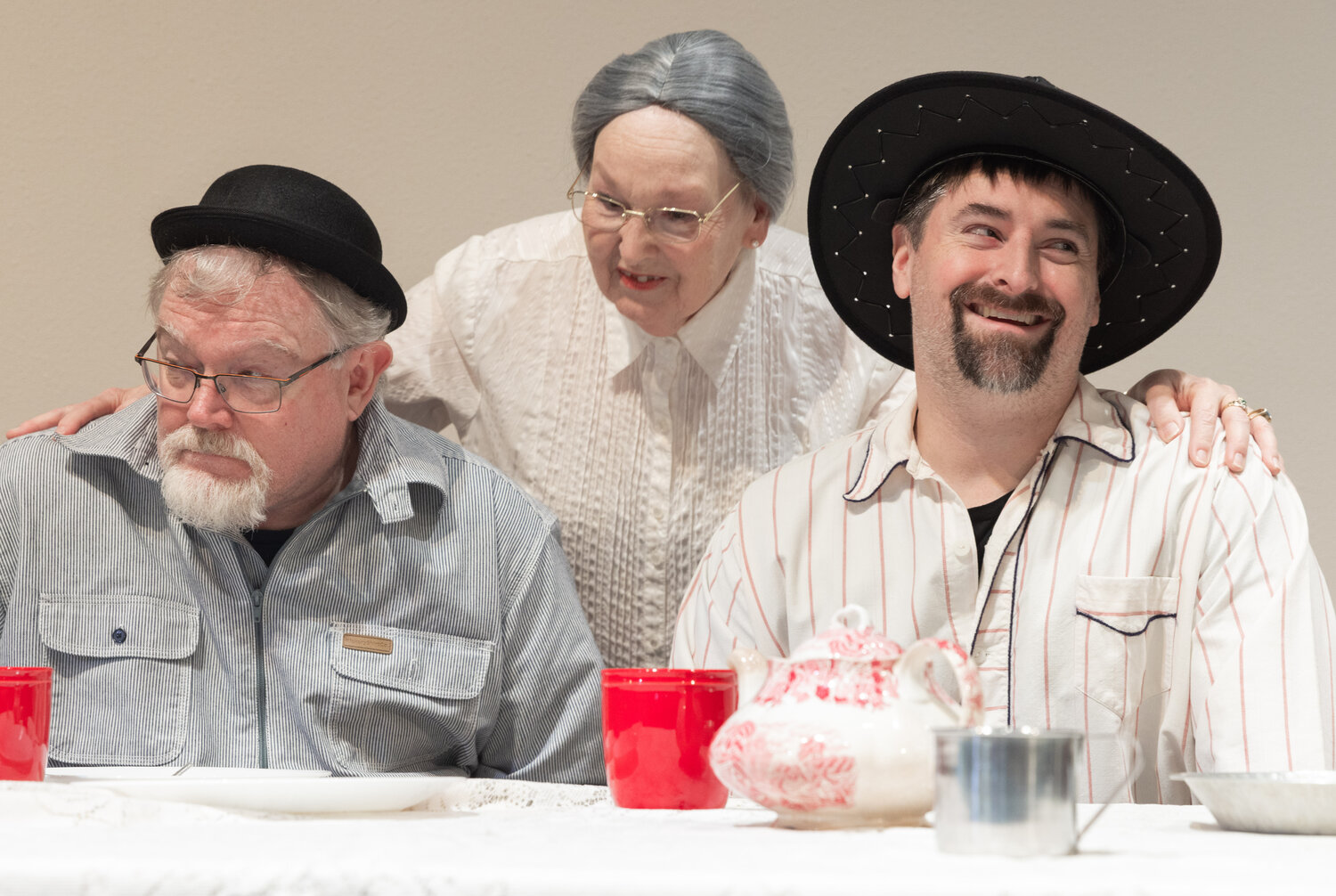 Randy Humphreys as Hector Bogonzoles, Kay Morton as Louise Binder and Alex Johnson as Jake Headley perform on stage during dress rehearsals for the Christmas at Rattlesnake Gulch play at Mountain View Baptist Church in Centralia.