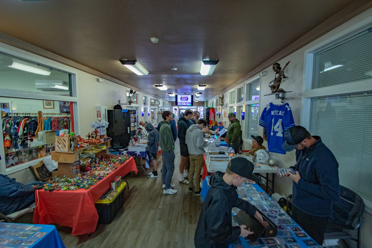Attendees browse vendor selections during the second Keiper's Cards and Memorabilia Show on Saturday, Dec. 2, in the Tower Plaza Mall in downtown Centralia.