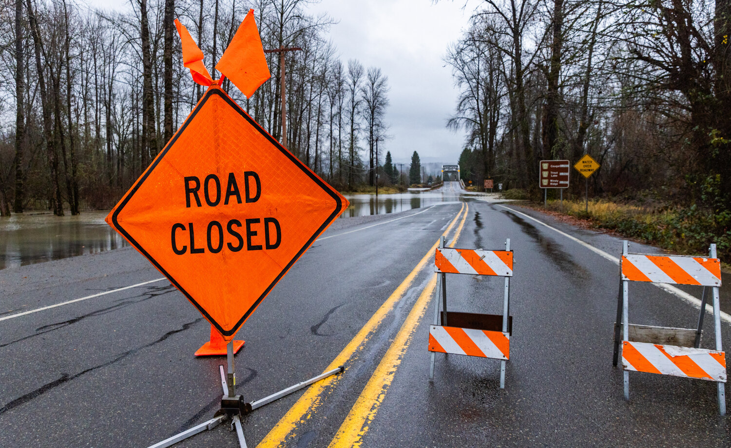 State route 131 in Randle remains closed as water spills over the roadway from the Cowlitz River on Wednesday, Dec. 6.
