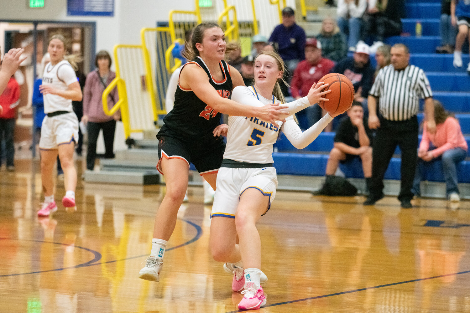 Rainier's Bryn Beckman guards Adna's Gaby Guard during the first half of the Mountaineer's 52-49 win over the Pirates on Dec. 8.