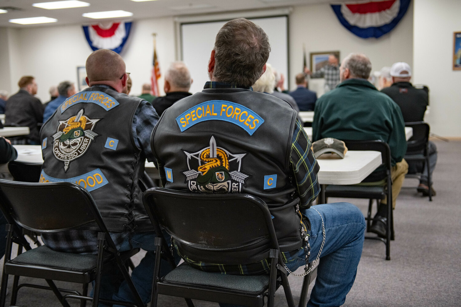 Attendees listen as Veteran Memorial Museum Director Chip Duncan gives an introductory speech during a ceremony honoring Medal of Honor recipient Franklin D. Miller at the Veterans Memorial Museum in Chehalis on Jan. 5.