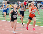 Napavine’s Morgan Hamilton pulls into second place during the 2B girl 200 meter dash State finals in Yakima on Saturday, May 27.