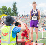 Onalaska runner Riley Carter smiles for a photo with medal earned for hurdles at the State track and field meet in Yakima on Saturday, May 27.