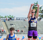 Onalaska’s Ben Russon holds up a medal after placing fifth in the 2B boys 800 meter run in Yakima on Friday, May 26.