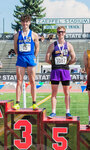 Adna’s Jordan Stout and Onalaska’s Ben Russon pose for a photo on the podium at third and fifth places respectively in the 2B boys 800 meter run in Yakima on Friday, May 26.