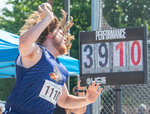 Pe Ell’s Owen Little throws the shot put during the 1B boys finals at the State track and field meet in Yakima on Saturday, May 27.