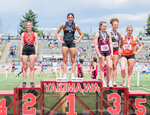Rainier’s Acacia Murphy takes first place in the girls 2B high jump while clearing the bar at 5’2” in Yakima on Saturday, May 27. Napavine’s Keira O’Neill also tied for third place during the event.